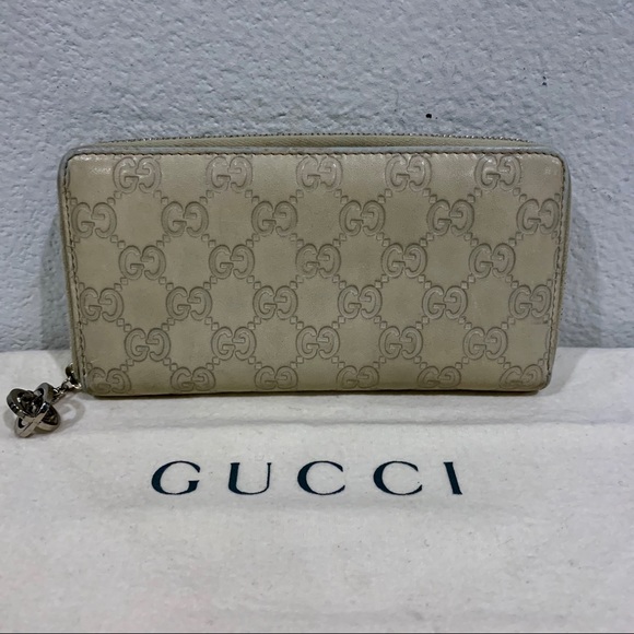 Gucci Handbags - GUCCI GG Supreme Leather Zip Wallet